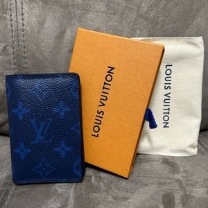 Louis Vuitton Card Holder. Blue taiga leather and monogram canvas.